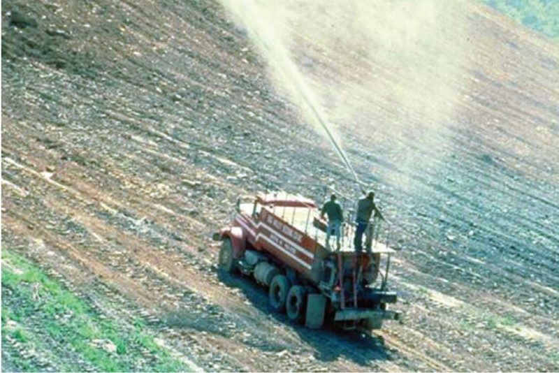  Figure 5. A hydroseeder applying seed in a fertilizer slurry while revegetating a surface coal mine.