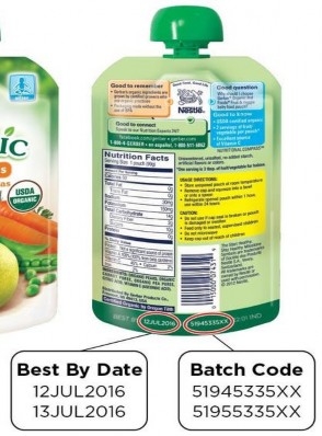 Expiration date and batch code on a green applesauce pouch.