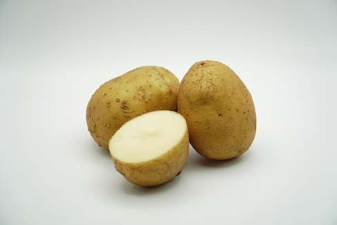 Close up of a cut up potato.