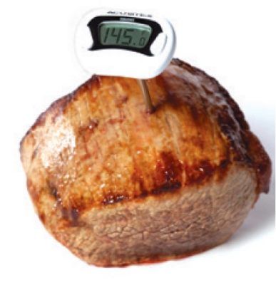 Steak piece with thermometer in it showing 145 degrees Fahrenheit