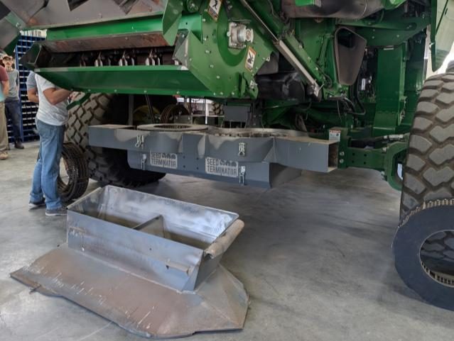 The Seed Terminator mounted to a John Deere combine.